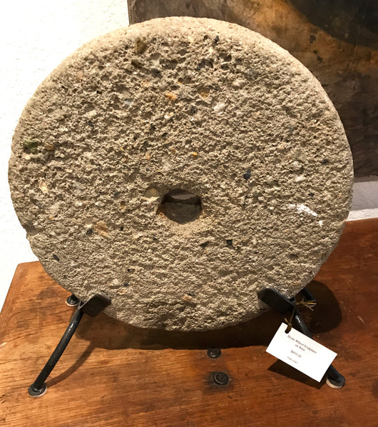 Stone Wheel Sculpture on Base